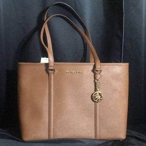 Brown/tan Michael Kors purse